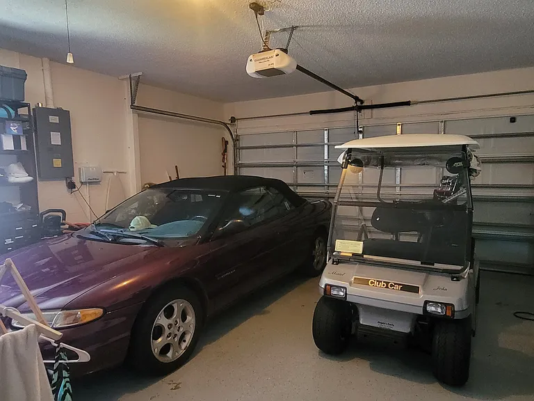 Pine Meadow garage and golf cart_02152023