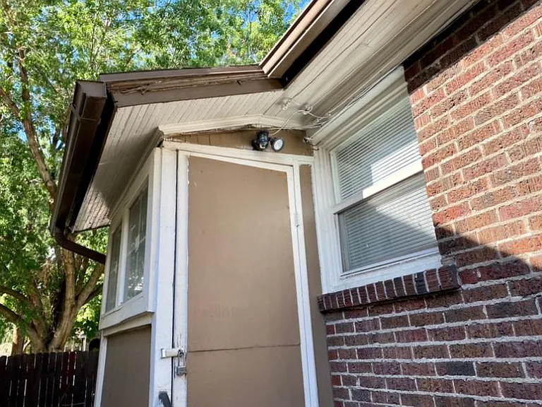 Separate entrance to shared laundry space (washer and dryer not provided or maintained by owner).