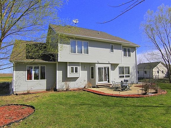 Rear View of Home with Patio