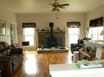 Living Room with Gas Burning Fireplace & Gleaming Hardwood Floors