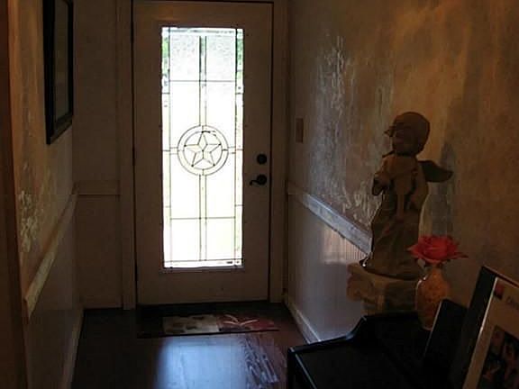 Wonderfully updated home with beautiful wood laminate in the entry.