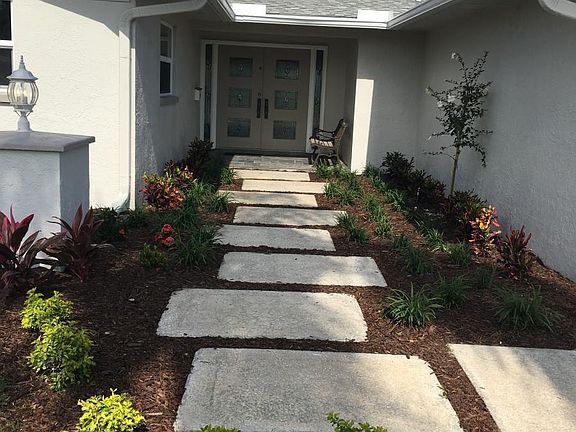 Walk way to front of house
