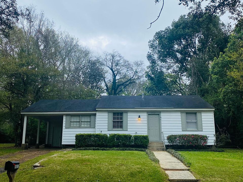 Street view. Covered parking for 1, additional parking in driveway & street parking is allowed.