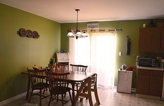 Dining Area w/ Slider leading to Deck