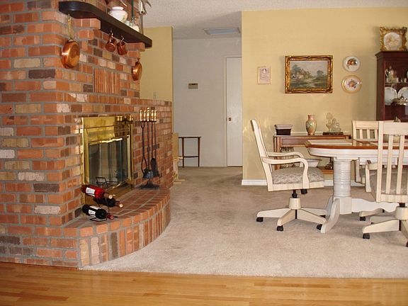 dining room amenities include a brick fireplace