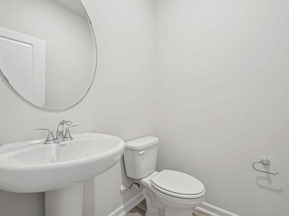 A half-bath is conveniently located on the first floor.