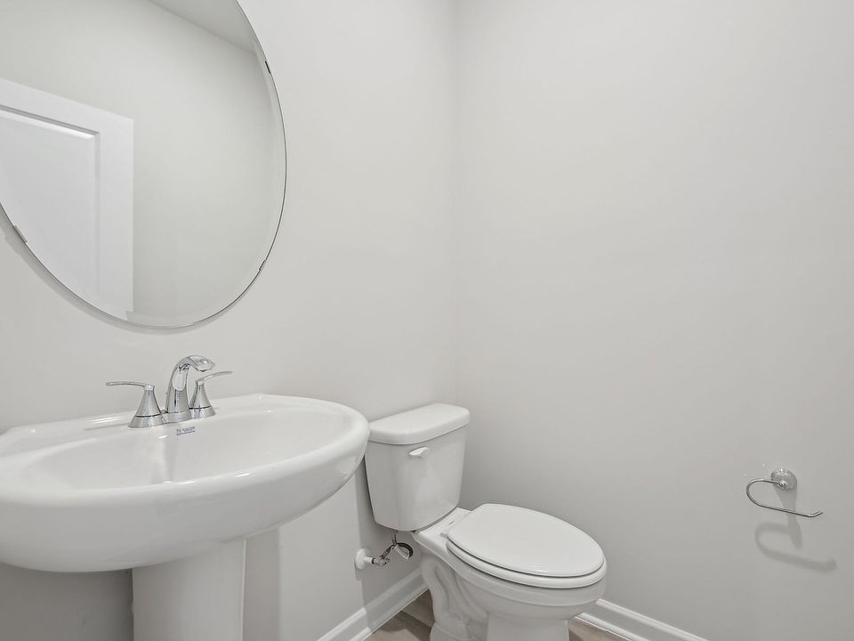 A half-bath is conveniently located on the first floor.