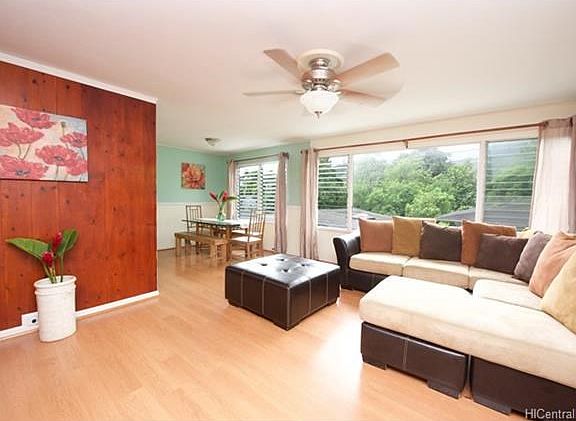 View from front door into living room and dining area