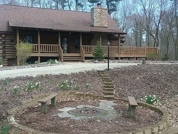 View of house with fire pit