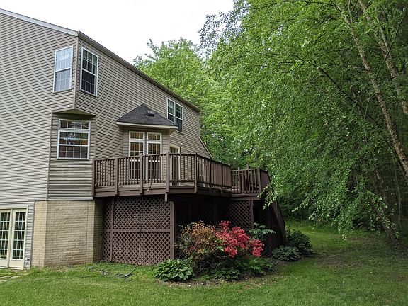 View of deck, storage barn is under the deck.