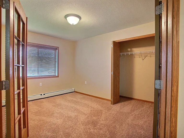 Fargo, ND Wolf Creek Apartments | Bedroom