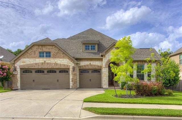 Gorgeous two-story brick and stone home in Teravista!