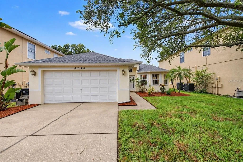 4756 Whispering Wind Ave — Photo 1