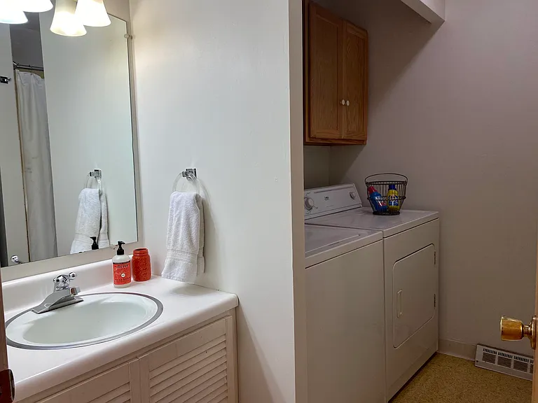full guest bathroom and laundry