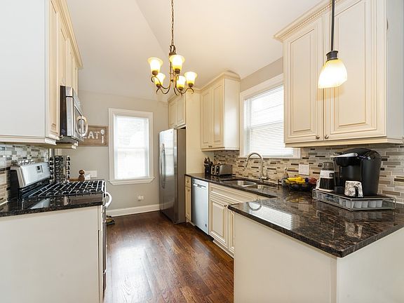 5th image of 3239 N Ozanam Ave