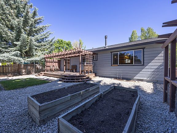 Enjoy your low maintenance backyard with loads of privacy