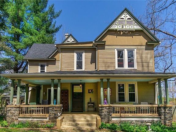 We painted the home this summer and its now white.