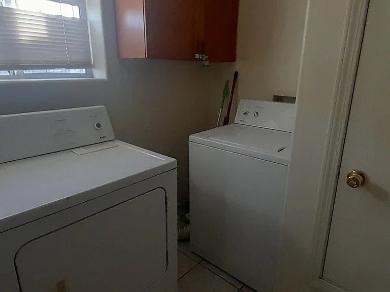 Utility room. Washer and dryer.