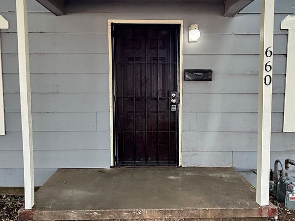 2nd image of 660 E 26th Pl N