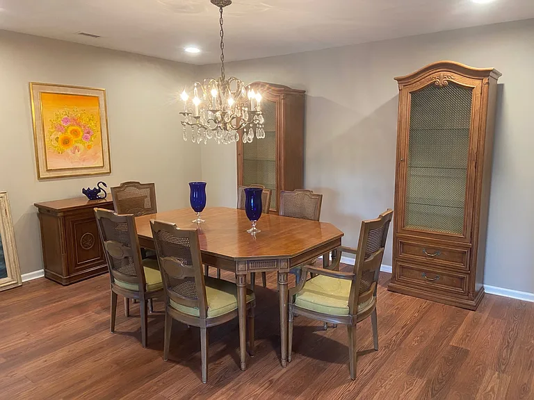 You can use the large dining table or make a spacious office . Space is large enough for a Day bed as well.