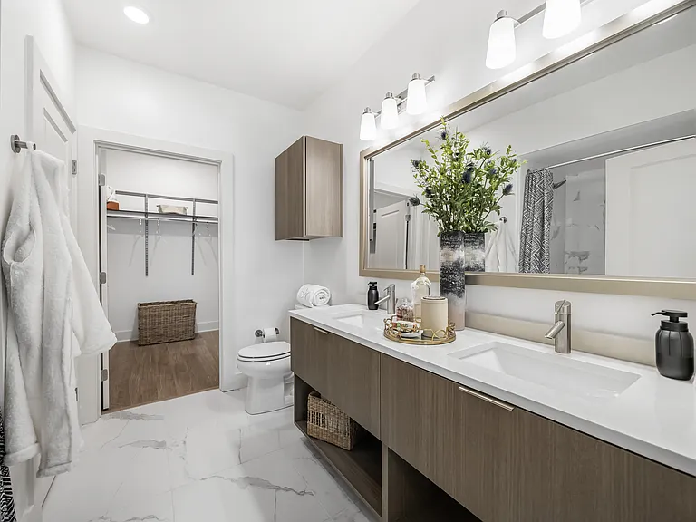 Serene bathrooms with double vanities in select homes