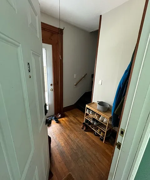 Entryway into 3rd floor, closet to the right