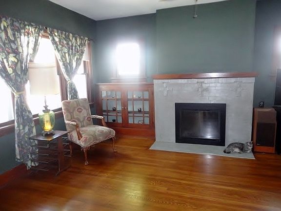 Entering the Living Room with Decorative Fireplace