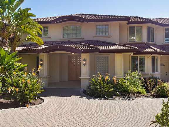 Stunning Lafayette estate offering 5 bedrooms, 4.5 bathrooms, and 4534 SqFt of refined living space.