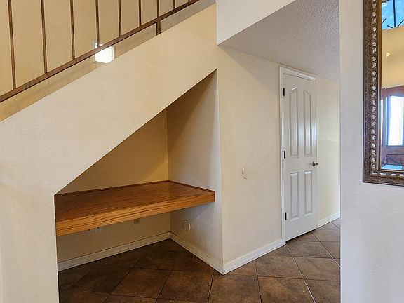Home office/media nook under stairs.