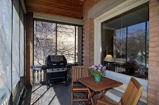 Enclosed porch great for summer days and barbeques