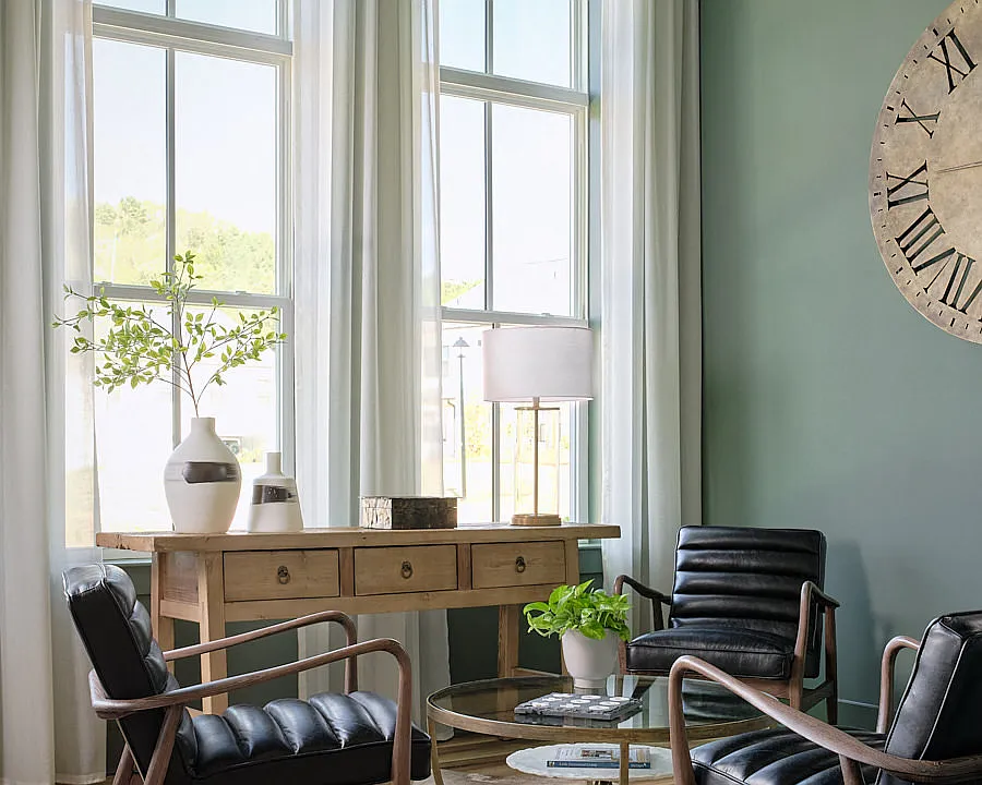 Stylish clubhouse lounging area with contemporary seating and natural light.