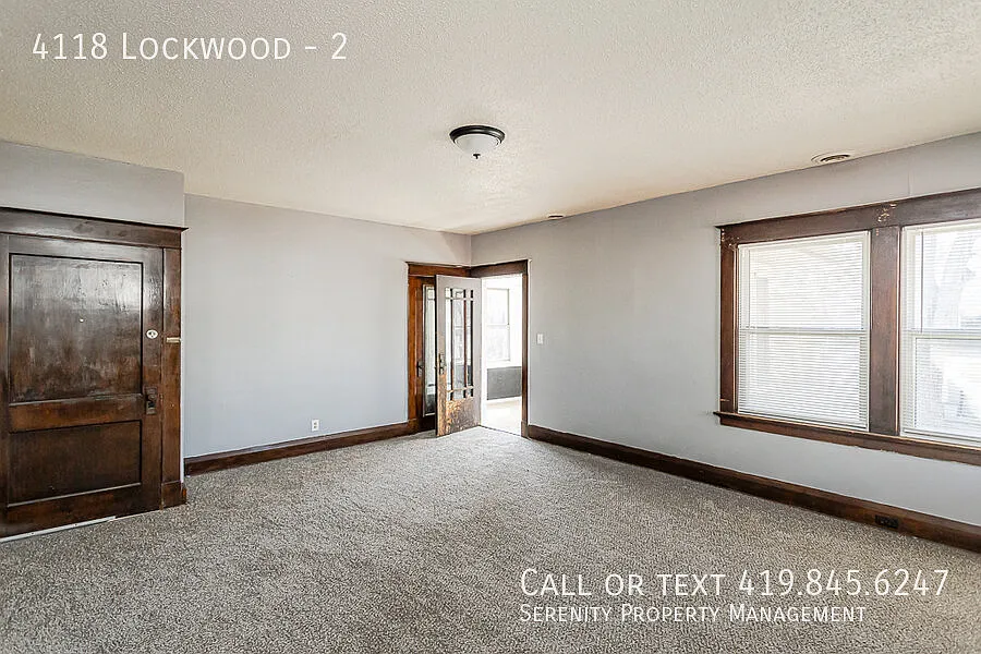 Fall in Love with Your New Home! Two Bedroom UPPR Unit In West Toledo! — Photo 4