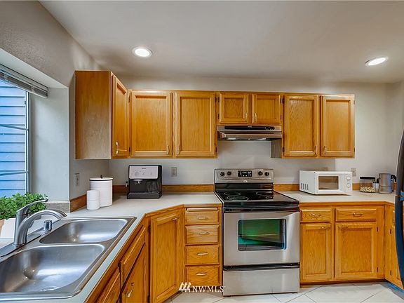 The heart of the home with lots of natural light, double sinks and eat-at bar!