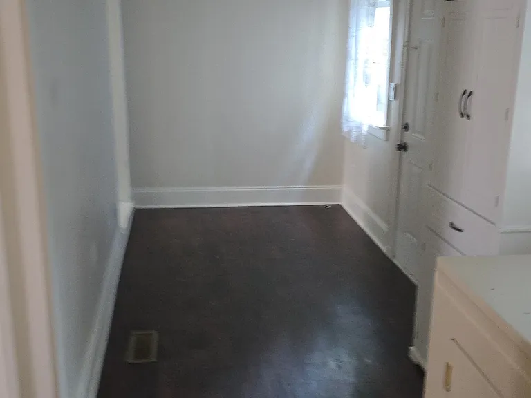 Separate and spacious laundry room.