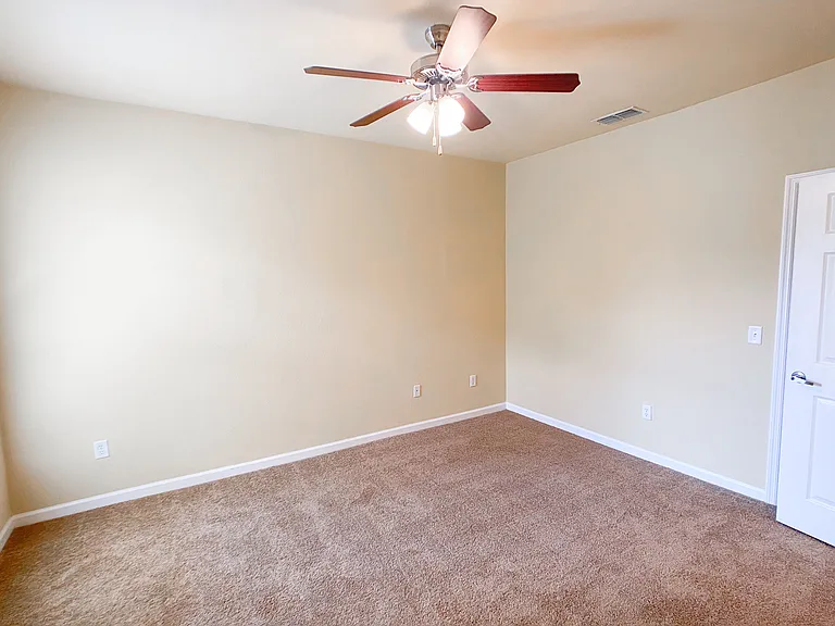 Large Bedroom with Lush Carpet and Walk in Closet Large Bedroom with Lush Carpet and Walk in Closet