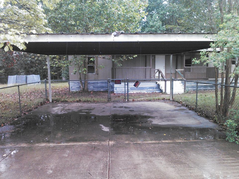Front View With Carport