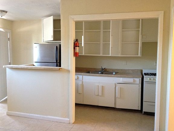 All new paint, light fixtures, ceiling fans, tile floors, an