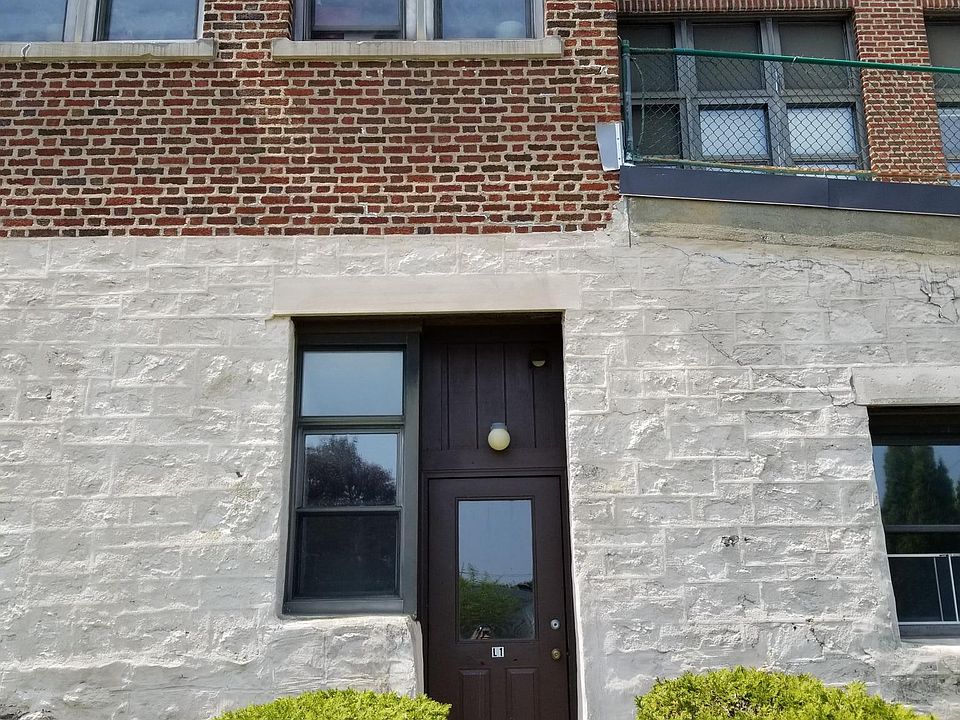 PRIVATE ENTRANCE, IN REAR PARKING LOT