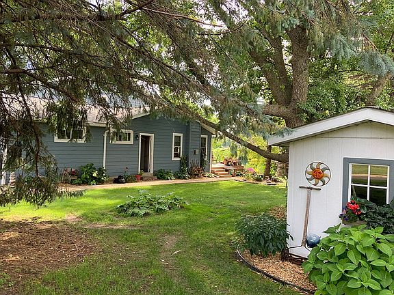 Side of House & Storage Shed