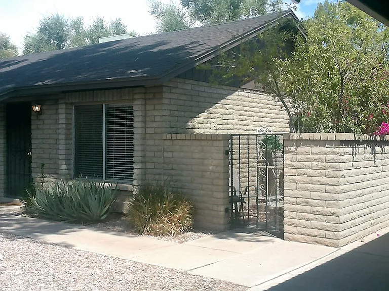 Your condo unit in the back courtyard with gated patio