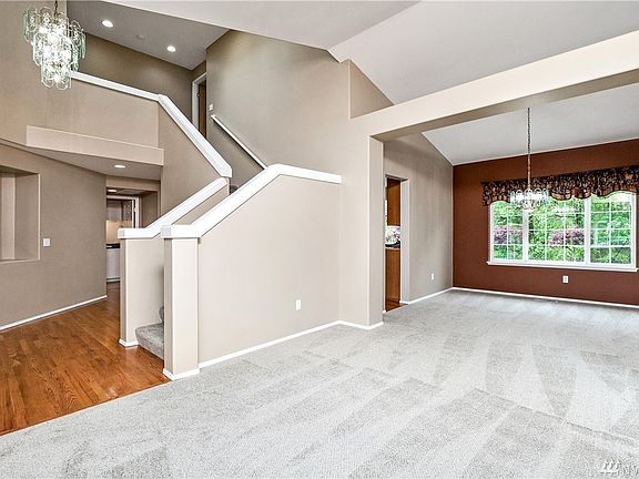 Entrance, living & dining rooms - brand new carpet throughout the house