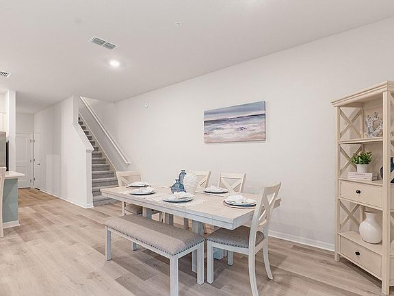 And, a dining room provides space for a table - Aspen townhome by Highland Homes