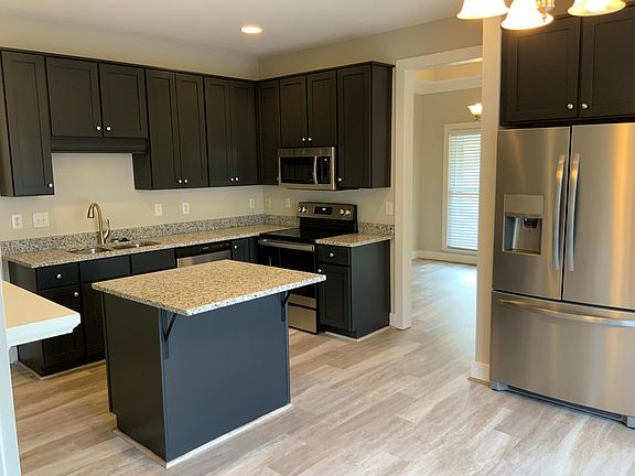 New cabinets, granite and stainless appliances