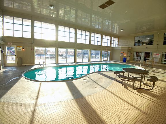 Indoor pool area including, sauna, and showers.