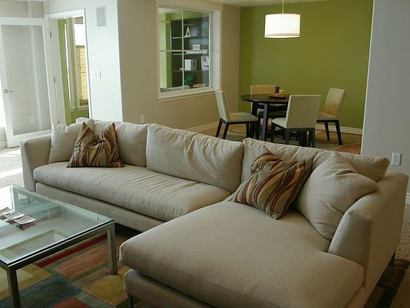L-shape sectional sofa with glass coffee table