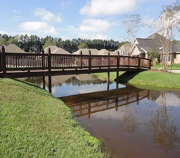 Stunning Bridge over pond to exercise in neighborhood walk your approved pet!