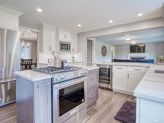 A gourmet kitchen for everyone.  Great for small and large gatherings.  The included beverage cooler is often overlooked when remodeling a kitchen but is the workhorse of any gathering. 