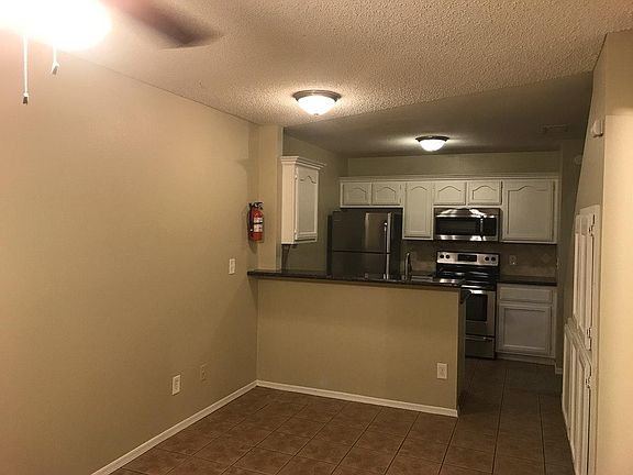 Family room view of kitchen