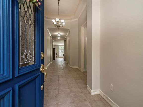 COME ON IN! NOTICE THE CROWN MOLDING AND CEILING TREATMENT.