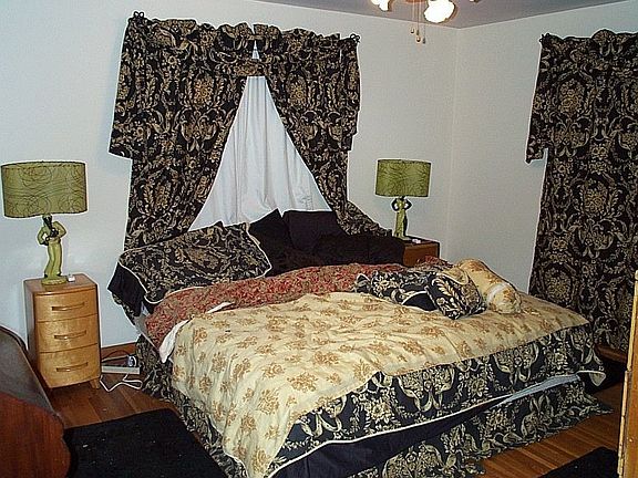 Huge master bedroom offers: double closets, hardwood floors & great light